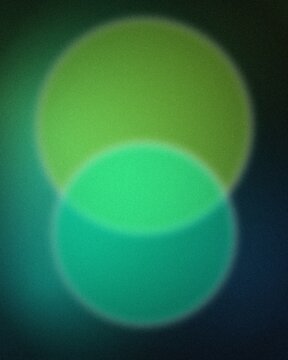 Glowing bioluminescent sphere emitting vibrant neon green light in dark abyss