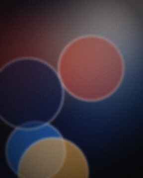 Vibrant overlapping circles in red, blue, and gold on dark gradient background for modern design