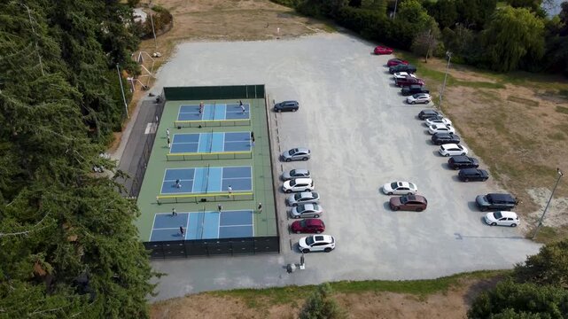 Drone aerial Tilt shot From West Vancouver Pickleball Courts Ambleside to Lionsgate Bridge