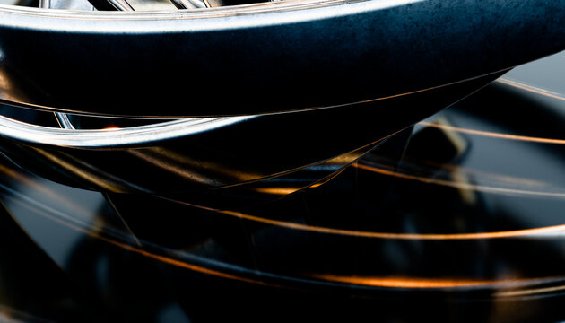 Abstract metal rings with dark reflective curved surfaces