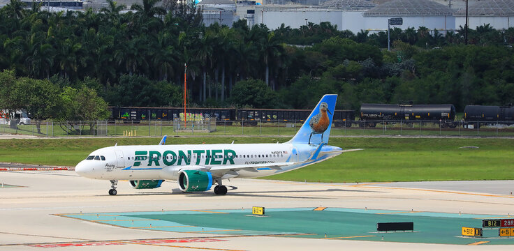 Frontier Airlines jet getting ready to take off from the Fort Lauderdale Hollywood International Airport in Fort Lauderdale, Florida, USA. 