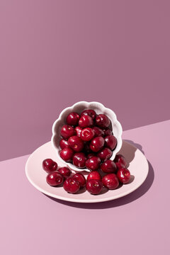 Picota cherries from Jerte Valley on a pink plate