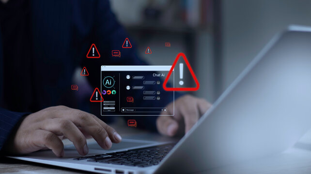 Businessman typing on laptop keyboard with warning alert icons over AI chatbot window interface. Concept of AI cybersecurity risks, artificial intelligence errors, and automated system bug.