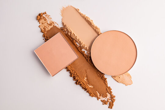Compact powder refill with decorative cosmetic swatches