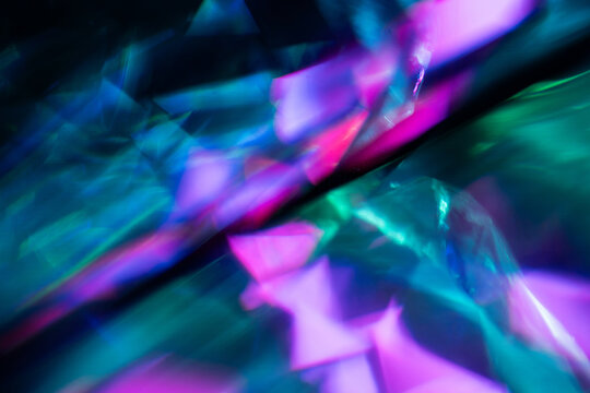 Abstract neon prism light texture with colorful reflections