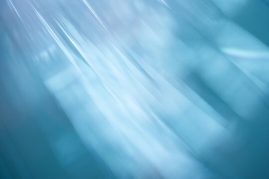 Abstract blue light rays with soft motion blur background