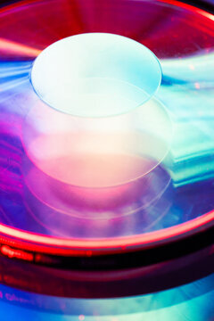 Abstract lens with neon light on tech background