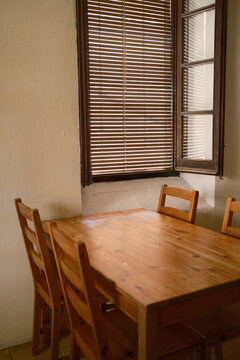 Rustic wooden dining table in Mura village home