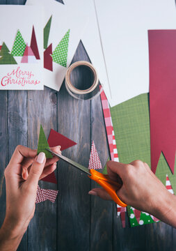 Christmas: Cutting Out Christmas Trees To Put Onto Card