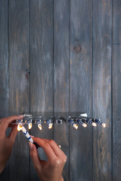 Hanukkah: Woman Lighting Candles In Menorah