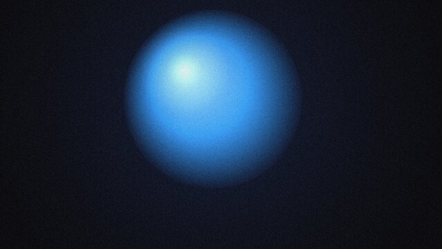 A bright blue sphere floating in a dark void with a soft light source creating a bright highlight on the upper left side of the round
