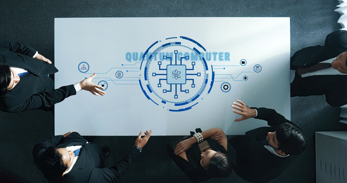 A team of business professionals engaging in a collaborative meeting about digital innovation, utilizing futuristic computer graphics for strategic planning and problem-solving. Trope