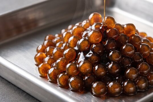 Boba pearls with syrup gloss for dessert toppings and beverage menus