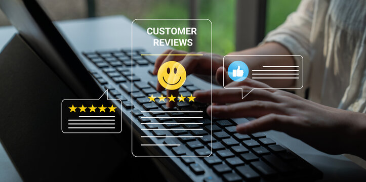 Close-up of hands typing on a keyboard with visible customer review icons, illustrating the importance of customer feedback and satisfaction in a modern office setting. Cyphers