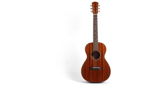 Small-body mahogany acoustic guitar on white background, six-string musical instrument for folk, blues and unplugged playing