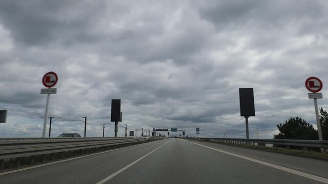 Nyborg, Denmark A view of driving over the Big Belt bridge, an 18-kilometer road and rail link hat connects the islands of Zealand and Funen. Opened in 1998.