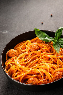 Spaghetti and meatballs tomato sauce meat dish tasty snack fresh gourmet food background on the table rustic food top view copy space