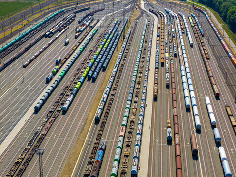 Aerial view of Emplacement Kijfhoek showing numerous parallel tracks filled with various freight train cars in Zwijndrecht, Zuid-Holland, Netherlands.