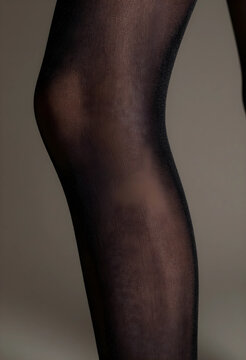 Fashion hosiery and legwear concept, close up of a womans leg in sheer black tights, elegant and comfortable apparel