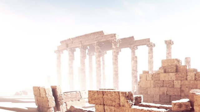 Stone columns and walls are visible in the desert under bright sunlight. Sand surrounds the aged structures, showing signs of weathering and time.