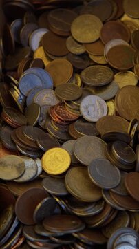 Old Brazilian Cruzeiro coins for sale at an antique market stall. Numismatics. Coins for sale to collectors