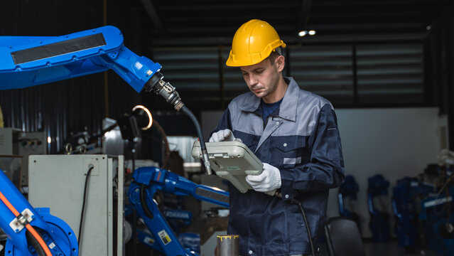 Skilled technician performing a detailed inspection on Industrial Robotic Machinery During Preventive Maintenance Scene 304