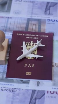 Denmark, Danish passport or id document with tickets for flight, travel. Danish passport