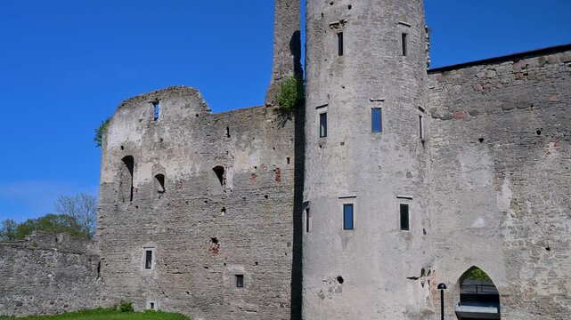 Haapsalu Episcopal Castle stone walls and tower against a blue sky in Estonia