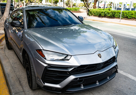 Luxury SUV Lamborghini Urus. Car Lamborghini Urus parked outdoor. Grey metallic car, low view. Miami, Florida, USA - July 27, 2025: Lamborghini Urus 2020 luxury SUV car