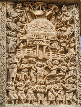 Aniconic Buddhist relief depicting the worship of a sacred stupa by devotees, celestial beings, and ritual celebrants, from the Great Stupa Torana at Sanchi, Sanchi Stupa Complex, India