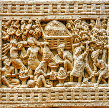 Early Buddhist aniconic sculpture depicting ritual veneration of a sacred stupa surrounded by worshippers and auspicious vegetation, Sanchi Stupa Complex, India