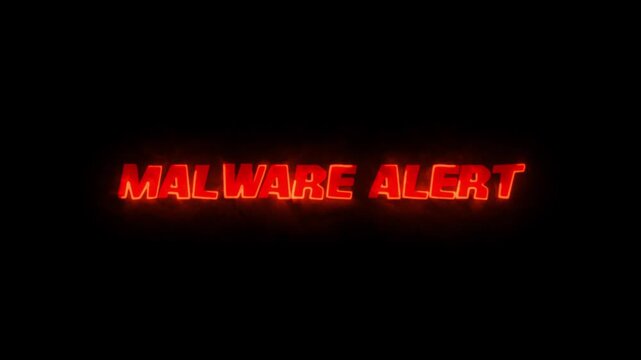 Malware alert words illuminated in glowing red futuristic typography present a warning on a pitch black background.