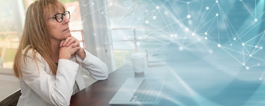 Portrait of thoughtful mature businesswoman; panoramic banner