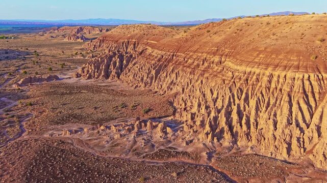 Aerial view of clay spires, pinnacles and fluted columns glowing at sunrise in Cathedral Gorge State Park, Nevada