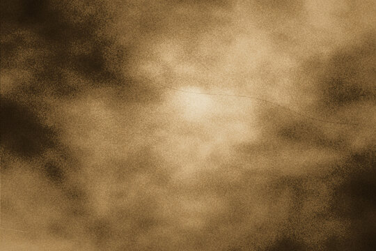 Vintage grunge texture with sepia tones and scratched effect for artistic background.