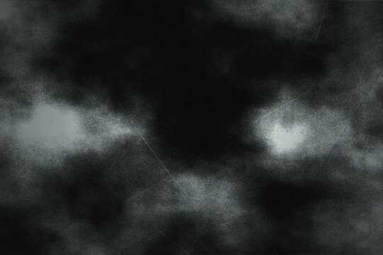 Abstract dark background with mysterious black and gray smoke effect, perfect for grunge designs and spooky Halloween themes.