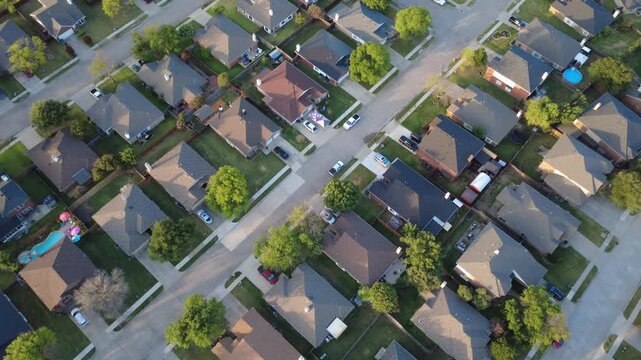 Interlocking streets converge near Tanglewood Place in Denton County Lakewood Estates. Turquoise pool waters, canopy shelters, parked sedans highlight vibrant community living, Little Elm, Texas