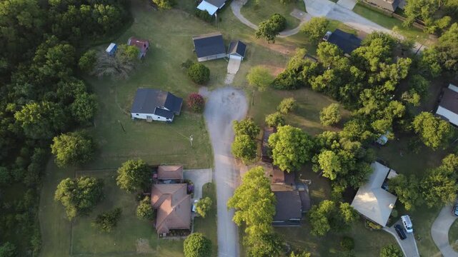 Unpaved cul de sac circles terminate quiet rural lanes near Lewisville Lake shores. Secluded homesteads, detached workshops, woodland borders capture peaceful retreat living, Little Elm, Texas