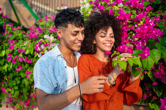 Married couple celebrates their love and bond through a quiet, intimate moment in a garden