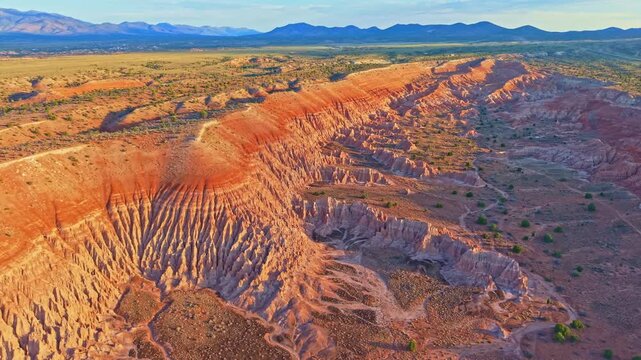 Aerial view of clay spires, pinnacles and fluted columns glowing at sunrise in Cathedral Gorge State Park, Nevada