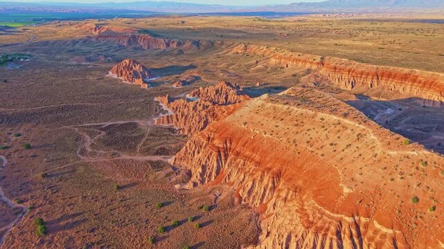 Aerial view of clay spires, pinnacles and fluted columns glowing at sunrise in Cathedral Gorge State Park, Nevada