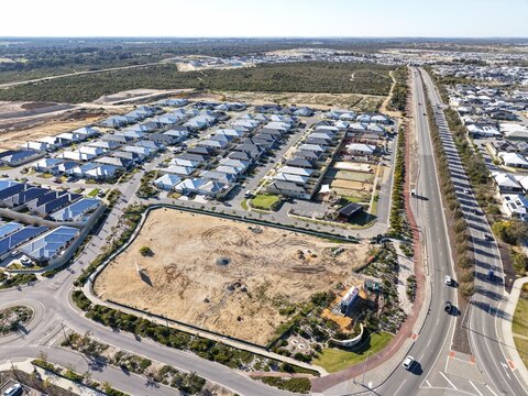 New Residential Housing Development Expanding Into Undeveloped Land, Aerial View