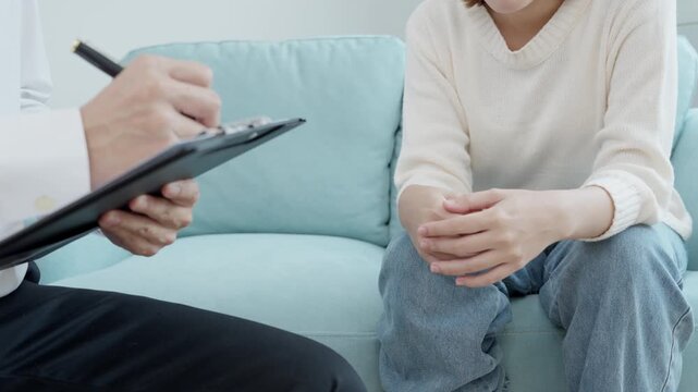 woman with mental health problems is consulting. psychiatrist is recording the patient's condition for treatment. encouragement, love and family problem, bipolar , depression patient, protect suicide