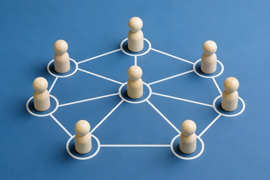 Network communication and teamwork concept with seven wooden pawns connected by lines forming a centralized structure