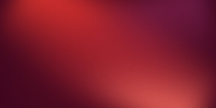 Abstract blurred background in shades of red and burgundy with a mosaic effect