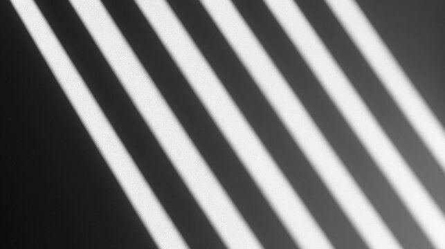 Window Blinds Shadow Creating Diagonal Lines on White Wall