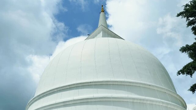 White Stupa Under Blue Sky at Homagama Temple Sri Lanka