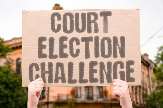 "Court Election Challenge" Legal action targets voting outcomes. COURT. ELECTION. CHALLENGE. LEGAL. VOTING.