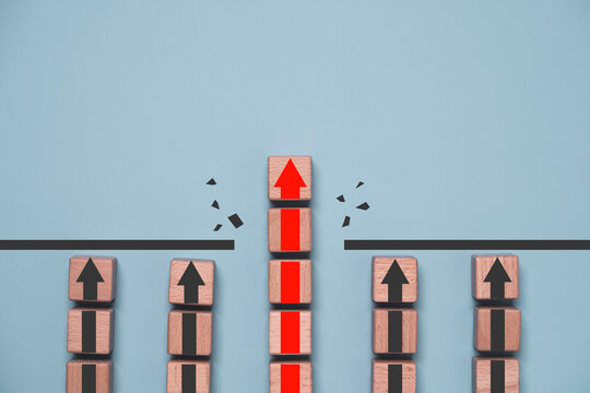 Red arrow breaking through barrier leads ahead of competitors, symbolizing business growth, leadership breakthrough success, ambition, competitive advantage, innovation and market strategy.