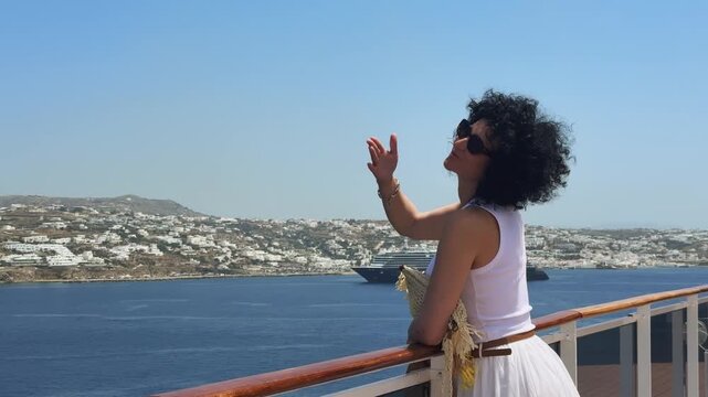 Happy Tourist Woman Waves Blows Kiss to Cruiser Arriving Mykonos Greece